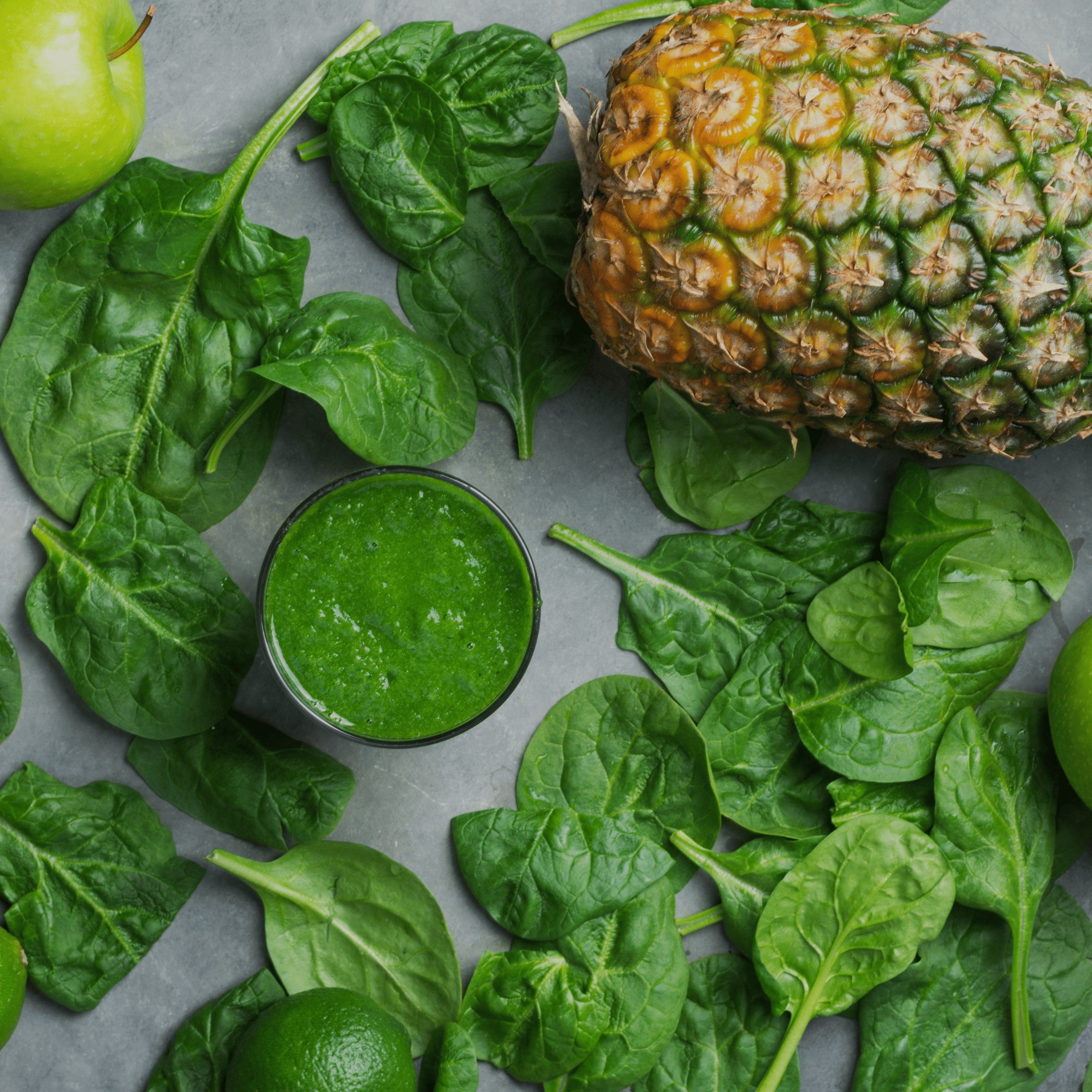 Image of a green smoothie mixed with detox probiotic