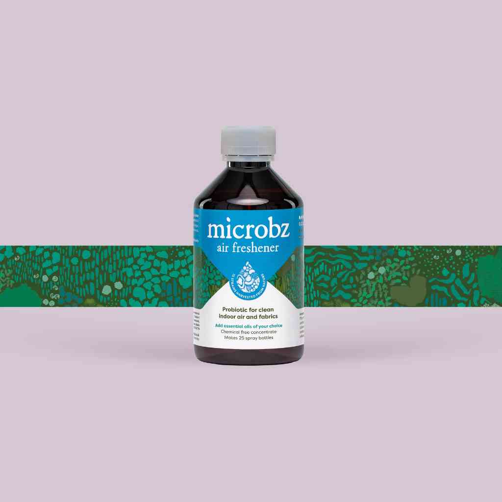 bottle of microbz living liquid probiotic for clean and fresh indoor environments, with graphic illustration