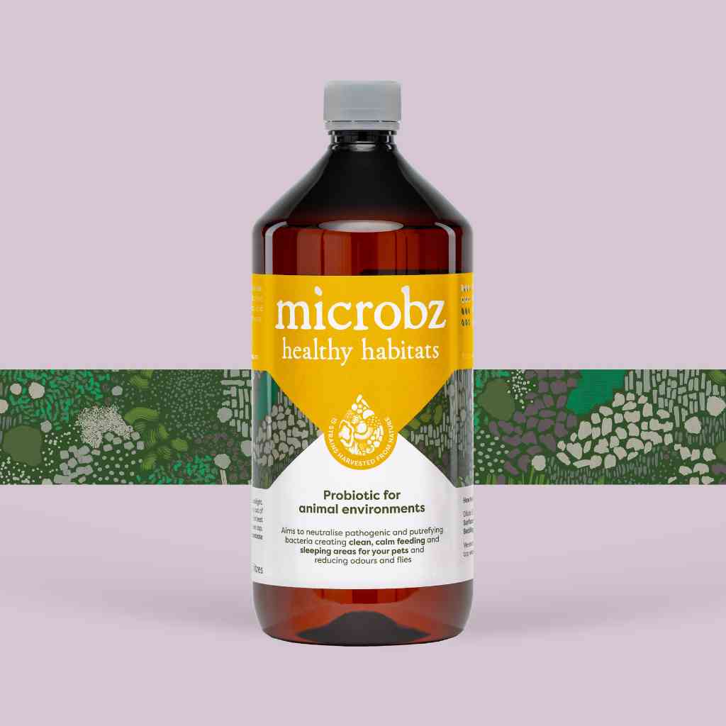 bottle of microbz healthy habitats  living liquid probiotic for healthy pet environments, with graphic illustration