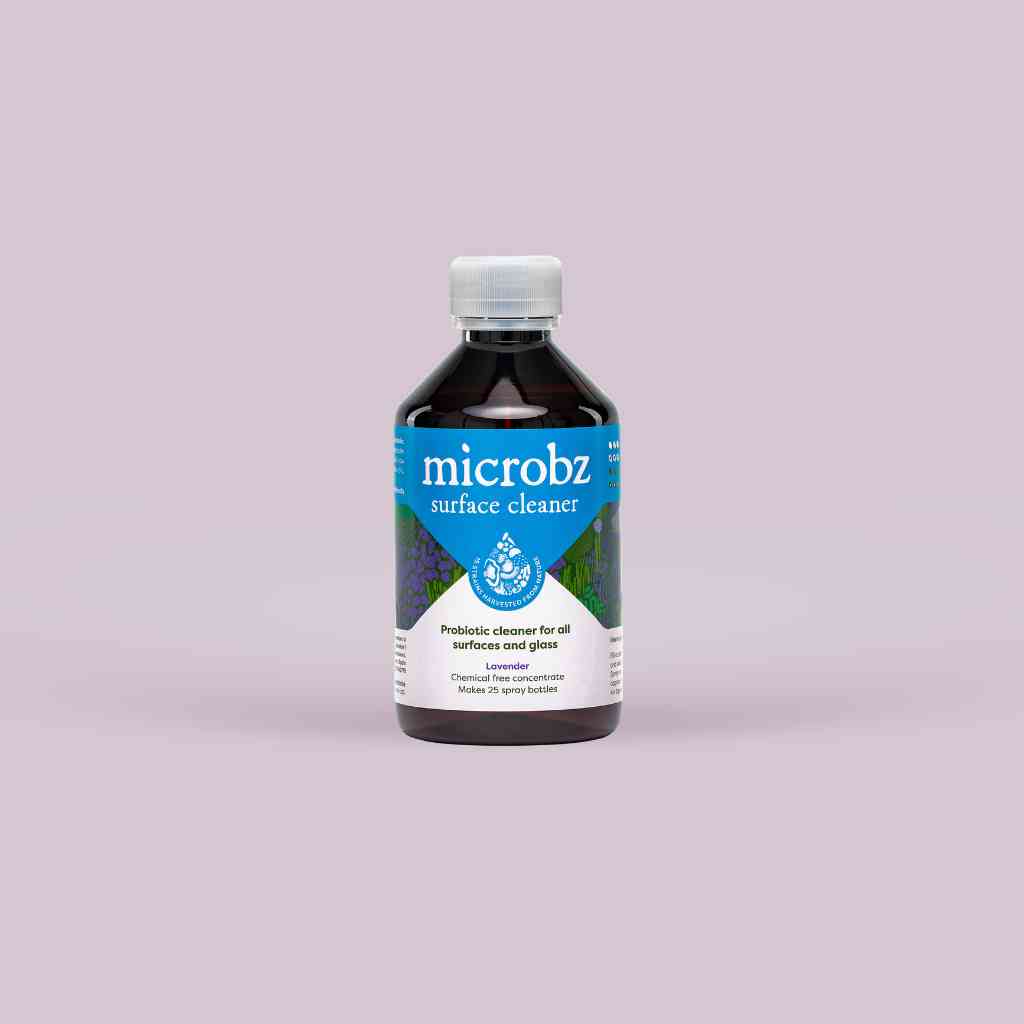 bottle of microbz surface cleaner living liquid probiotic for cleaning surfaces and glass